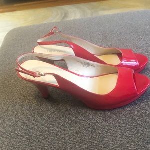 Red Nine West sling back open toe shoes.